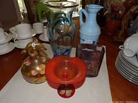 View of all five items on a table, showing shapes, colors and arrangement.