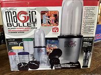 Original Magic Bullet box showing 21-piece set and appliance image