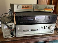 Stacked view of all five components: Quad tuner, Quad preamp, SAE TWO tuner, Toshiba tuner, Quad 303 amplifier