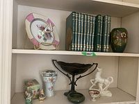 Full view of shelving unit showing all lot items