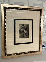 Framed heliogravure print by Paul Cezanne presented with double mat in wooden frame.