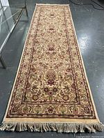 Full view of runner on floor, showing overall pattern and fringe