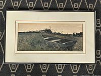 Full view of the framed vintage print showing the boats and house scene.