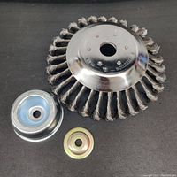 Photo showing the top view of the 8-inch steel wire brush trimmer head with two washers for mounting.