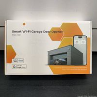 Front of box showing Smart Wi-Fi Garage Door Opener RSG100 with graphic of garage and smartphone app.
