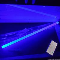 Light saber glowing blue in a dark room to show light effect and blade length.