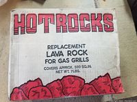 Photo of sealed Hotrocks replacement lava rock box with product details visible