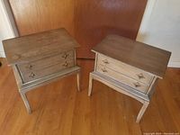 Pair of Thomasville nightstands viewed from an angle showing wear on tops and overall finish condition.