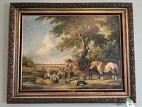 Full view of the framed print showing a rural autumn landscape with people, horses, and a dog under a large tree.