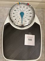 Full scale showing platform and dial with markers.