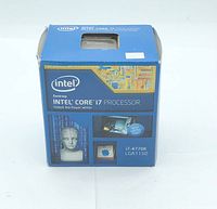 Blue retail box for Intel Core i7-4770K desktop processor with branding and socket details visible