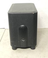 Front view of black Klipsch speaker showing grille and shape
