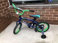 Full side view of Movelo Rush kids bicycle with training wheels