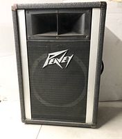 Front view of Peavey 112H speaker enclosure showing speaker grille, woofer, horn tweeter, and Peavey logo