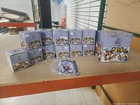 Lot displaying eleven Kringle Hollow collectible boxes by Schmid, showing general lot contents.