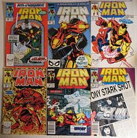 Front covers of six Iron Man comic books from issues #234, 238, 239, 243, 244, 245 with detailed action scene covers featuring Iron Man and Spider-Man, and typical 1980s Marvel layout.