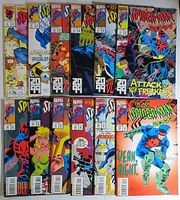 Front view of twelve Spiderman 2099 comic books fanned out, showing colorful cover art from early 1990s Marvel series.