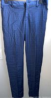 Full front view of blue checkered Selected Homme men's pants, showing length and fit