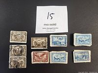 Photo showing a selection of Canadian air mail stamps in used condition, varying denominations and designs visible including blue 7 cent stamps, brown 6 cent, and red 6 cent airplane design stamps.