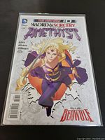 Front cover of Sword of Sorcery Amethyst #0 comic book featuring character Amethyst wielding sword, vibrant colors and text details