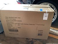 Cardboard shipping box showing Ivation branding, model number and product description