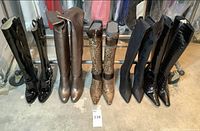 Front view of five pairs of boots arranged side by side