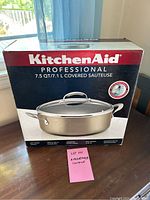 Box front showing KitchenAid Professional 7.5 Qt Covered Sauteuse branding and image of product.