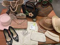 Overview photo showing all items in the lot including bags, hats, shoes, clutch bags, jewelry box, and bag cover.