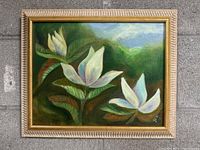 Full view of the magnolia oil painting in textured wooden frame with gold inner border.