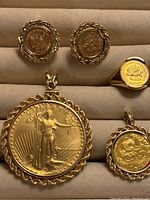 Full set: two coin stud earrings, coin ring, large American Eagle pendant and smaller Panda pendant