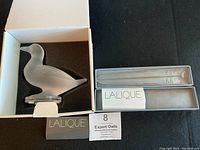 Boxed Lalique crystal Gedeon Canard duck sculpture and letter opener, including original packaging and booklets