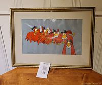 Framed animation cell art showing five red bird character poses in sequence