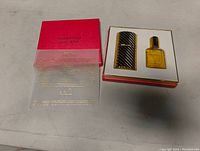 Estee Lauder Beautiful perfume set displayed in box with bottle and compact.