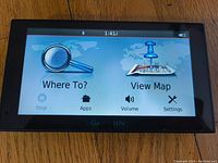 Front view of Garmin Nuvi 2689 showing main screen with 'Where To?' and 'View Map' options.
