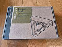 Closed box with Magpul branding and Carbine Stock label on cardboard box.