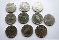 Ten Canadian one dollar coins displayed with reverse sides showing various wildlife and design motifs.
