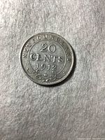 Obverse side of the 1912 Newfoundland 20 cent coin showing denomination and year
