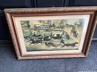 Framed print with gold-tone ornate frame showing the entire artwork and frame condition.