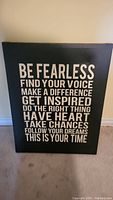 Framed motivational words of affirmation poster in black and white with inspirational phrases.