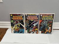 Photo of three Battlestar Galactica comic books issues #1, #2, and #3, all bagged and boarded