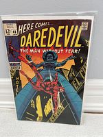 Front cover image of Daredevil #48 comic book with Daredevil character fighting a villain, showing the full cover art, issue number, and price.