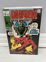 Front cover of Daredevil #64 comic book May 1970, bagged and boarded, showing Daredevil fighting The Stunt Master on a motorcycle.