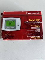 Honeywell SuitePRO TB6575A1000 thermostat new in original red box showing product details and branding