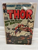Photo of the bagged and boarded comic book featuring the cover of Journey Into Mystery with The Mighty Thor, issue 117 from June 1965.