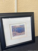Framed print of the Tom Thomson artwork, overall view showing the frame and print titled 'Spring Ice'.