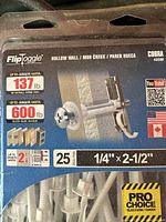 Blister pack of Flip Toggle hollow wall anchors 1/4" x 2-1/2" with label showing weight capacity and product info.