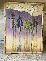 Full framed batik textile artwork showing African people and ox in landscape with purple hues.