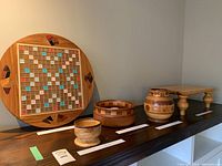 Overview of lot contents: Scrabble board, small bowl, salad bowl, vase, tray