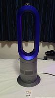 Front view of Dyson Hot+Cool AM04 EVO unit showing full loop design and base