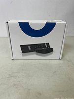 Outer box image showing Bell streaming box and remote on the package front.